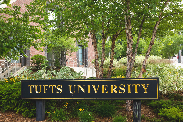 an image of the Tufts University sign on the Medford campus